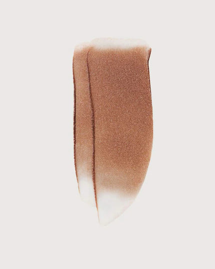 MERIT 
Day Glow Dewy Highlighting Balm