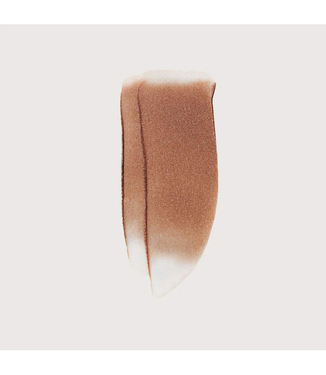 MERIT 
Day Glow Dewy Highlighting Balm